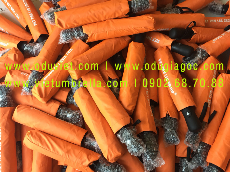 xưởng sản xuất ô dù cầm tay in logo quảng cáo